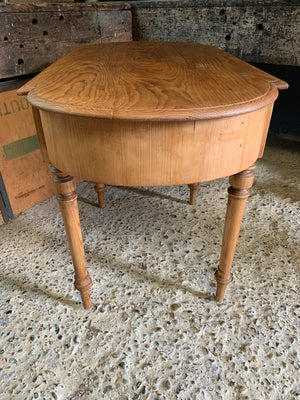 A Victorian pine breakfront table with two drawers