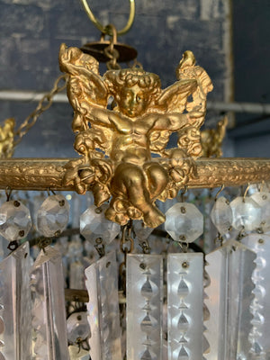A gilt three tier crystal lustre chandelier - large