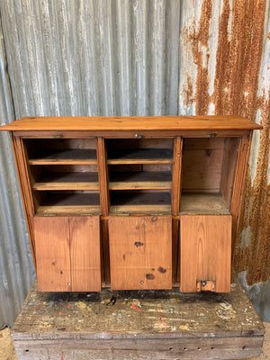 A pine six slot pigeonhole cabinet