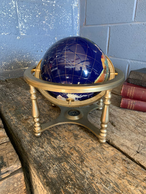 A terrestrial gemstone globe