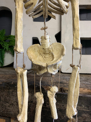 A papier-mâché skeleton model in the Dia de Muertos/calavera style