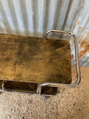 An Art Deco three tier chrome drinks trolley