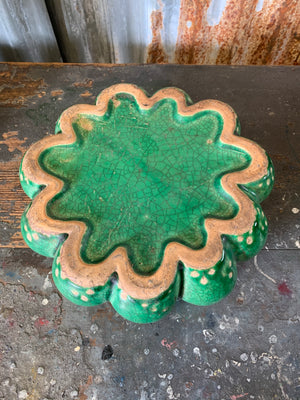A green studio pottery coral form vase in the style of Pols Potten