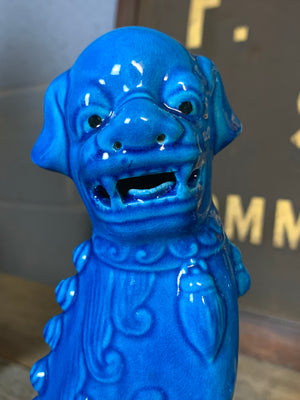 A pair of turquoise ceramic Chinese foo dogs