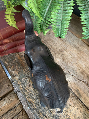 A black leather elephant figure