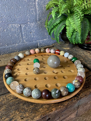 A very large semi precious stone solitaire game