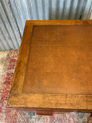 A Modernist oak twin pedestal desk