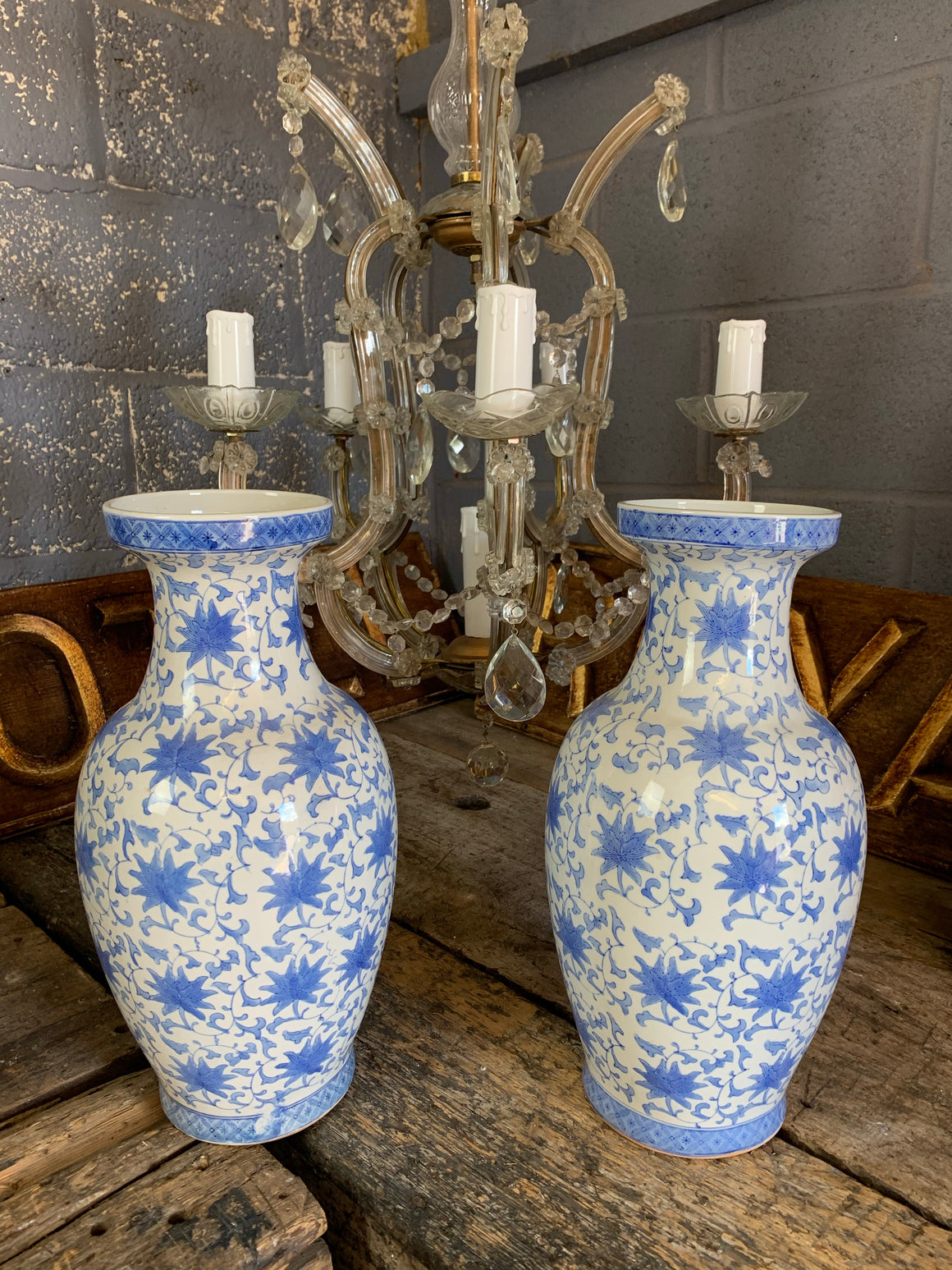 A pair of large hand painted blue and white Chinese vases