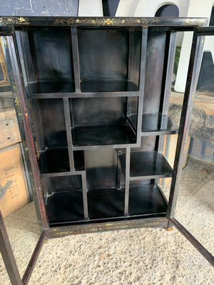 A black lacquer Chinoiserie display cabinet