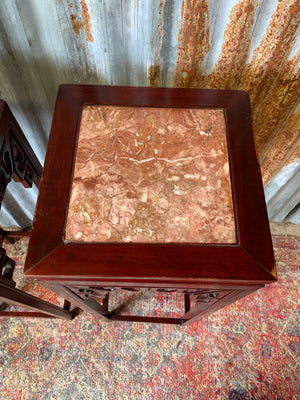 A pair of Chinese marble pedestal stands