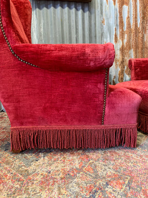 A pair of French red velvet armchairs
