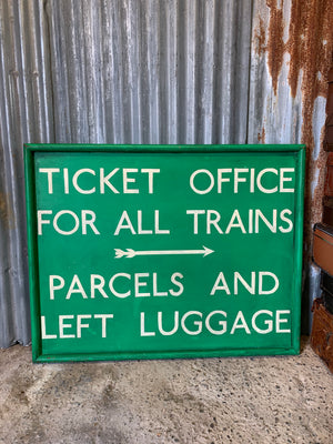 A large hand painted railway ticket office sign