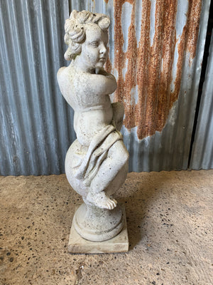 A cast stone musical putto garden statue - 88cm