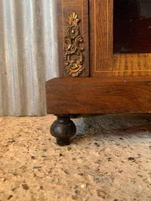 A Victorian single door inlaid pier display cabinet