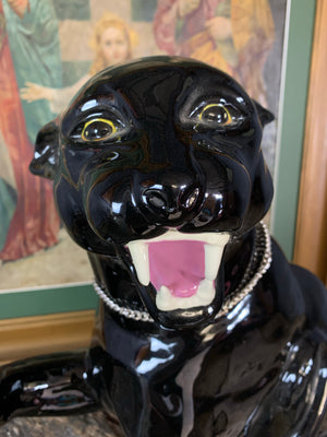 A large ceramic black panther
