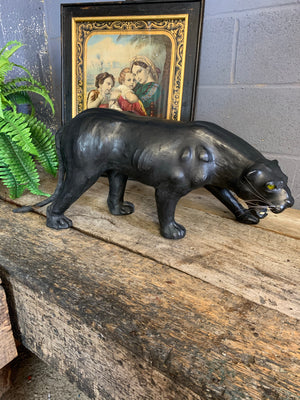 A very large mid century black leather panther (83cm)