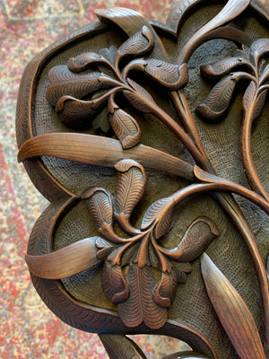 A profusely carved Anglo-Indian table by Jubbar Khan & Son