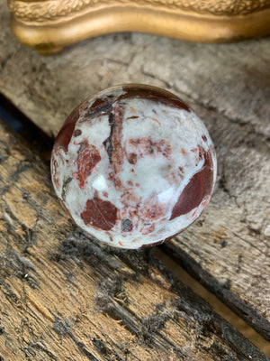 A set of four Grand Tour marble spheres