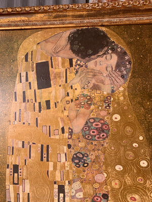 A large copy of The Kiss painting by Gustav Klimt