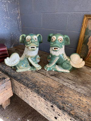 A pair of ceramic Chinese foo dogs