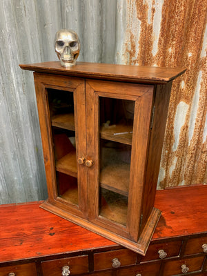 A Victorian-style table top cabinet