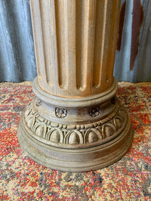 A carved wooden column