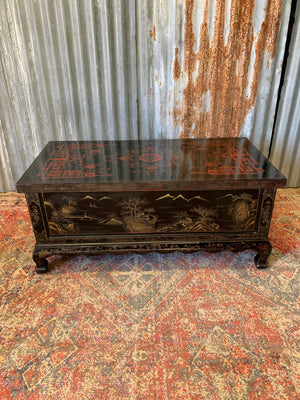 A 19th Century black lacquered Chinoiserie coffee table with four drawers