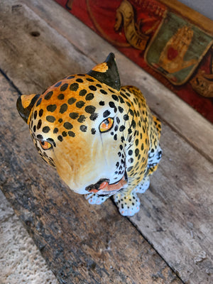 A large terracotta leopard statue made in Italy