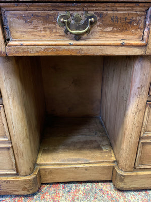 A Victorian limed oak pedestal desk