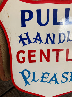 A hand painted fairground advertising sign - Pull Handle Gently!
