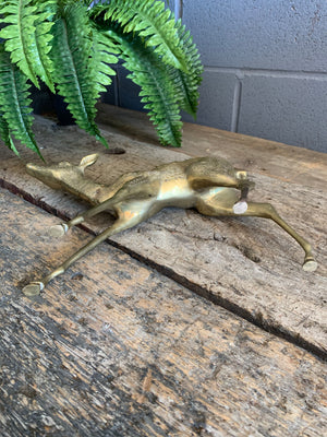 A large brass Mid-Century Hollywood Regency fawn statue