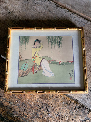 A pair of silk Geisha paintings