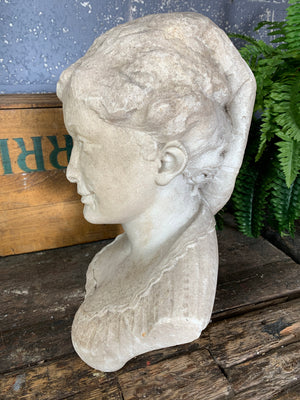 A 19th Century solid marble bust of a girl - signed "A Rodin"