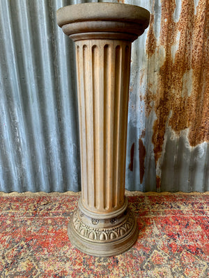 A carved wooden column