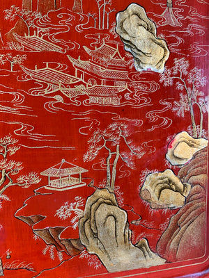 A red and gold lacquer Chinoiserie cabinet