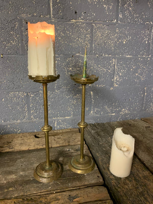 A large pair of tall Gothic church pricket candlesticks