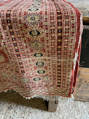 A kilim rectangular red rug