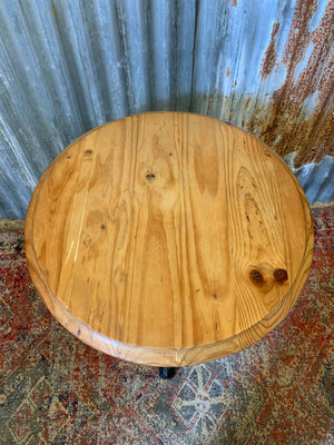 A cast iron Britannia garden table with oak top