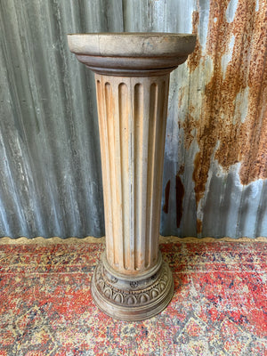 A carved wooden column