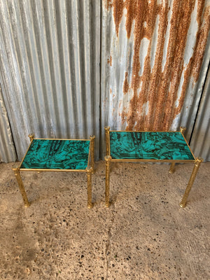 A pair of Hollywood Regency brass and simulated malachite side tables