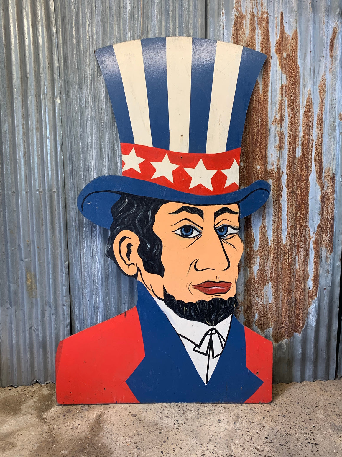 A painted fairground panel of Abraham Lincoln