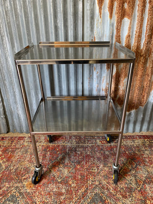 A stainless steel two-tier medical trolley ~ 2