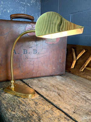 A brass banker's lamp