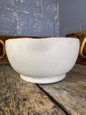 A very large ceramic mortar with matching pestle