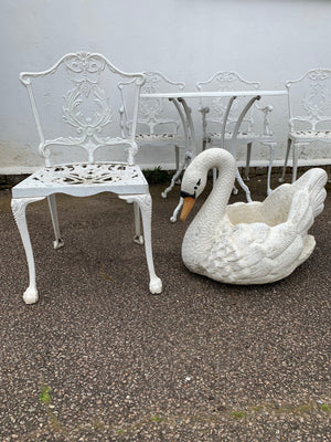 A very large cast stone swan planter
