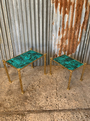 A pair of Hollywood Regency brass and simulated malachite side tables