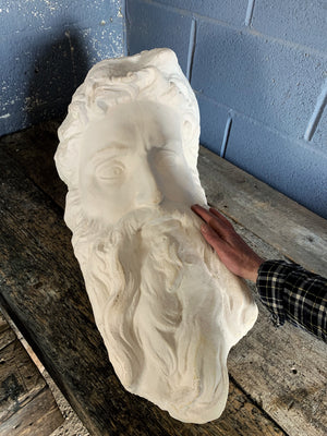 An oversized Renaissance plaster head