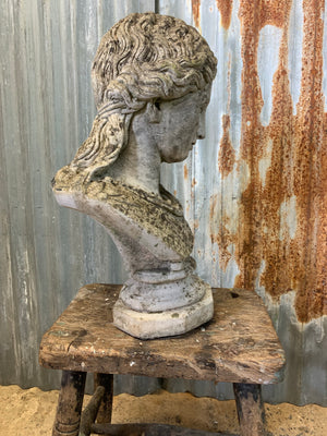 A cast stone classical female bust