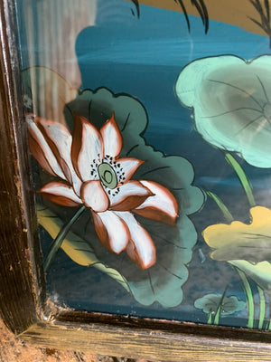 A large reverse painted glass Geisha picture