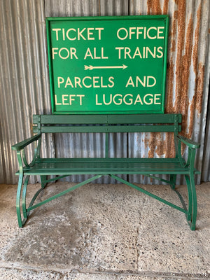 A large hand painted railway ticket office sign